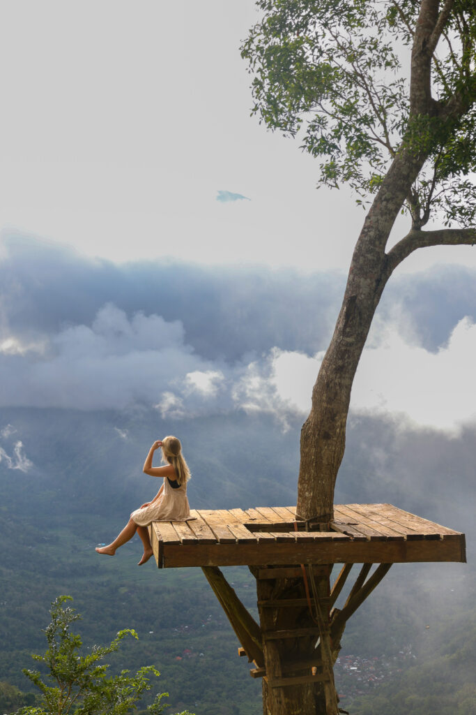 easy ways to make travel cheaper - female travel blogger